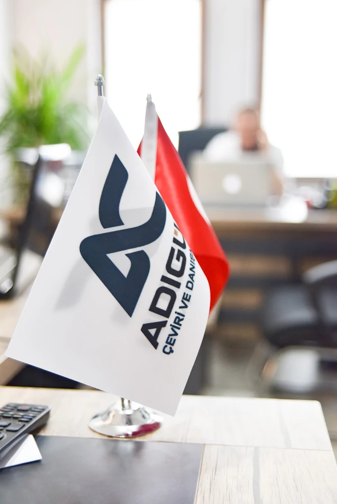 Adıgün Tercüme Bürosu kurumsal bayrak